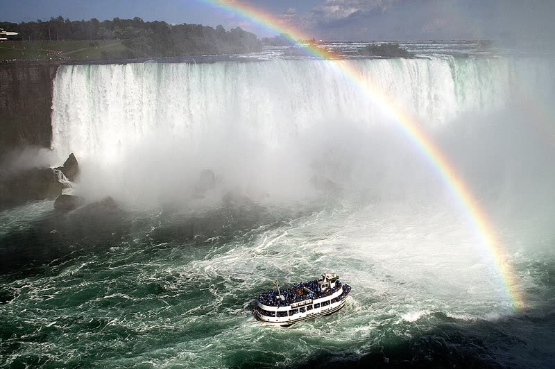 Rainbow arcing over the Maid of the Mist at the base of Horseshoe Falls